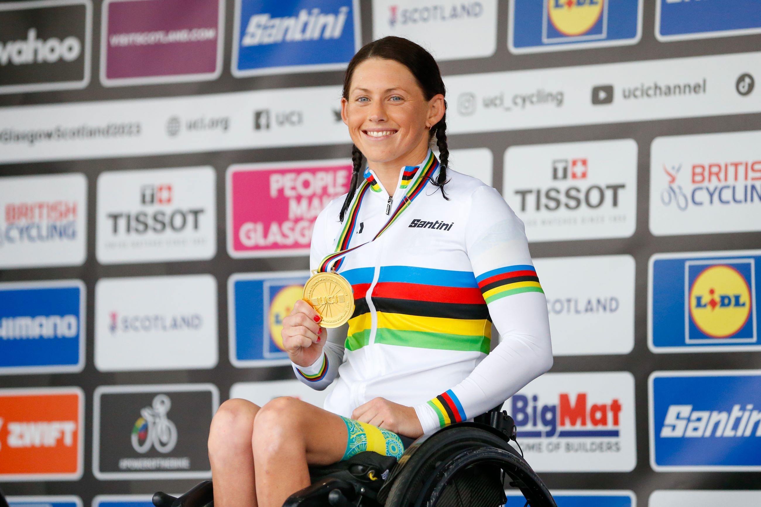 Australian para-cyclist hand-cyclist Lauren Parker in the rainbow jersey of world champion with gold medal at the 2023 UCI World Championships in Glasgow, Scotland, Dumfries and Galloway